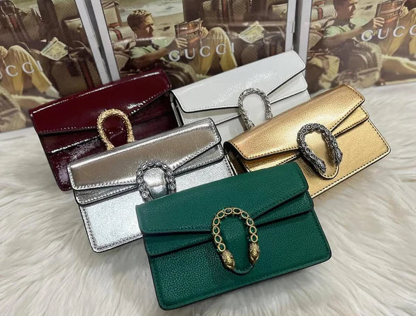 Guvcci mini dionysus cross body bag