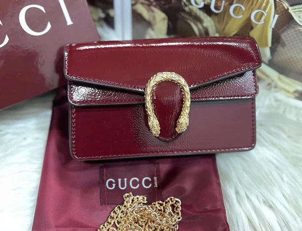 Guvcci mini dionysus cross body bag